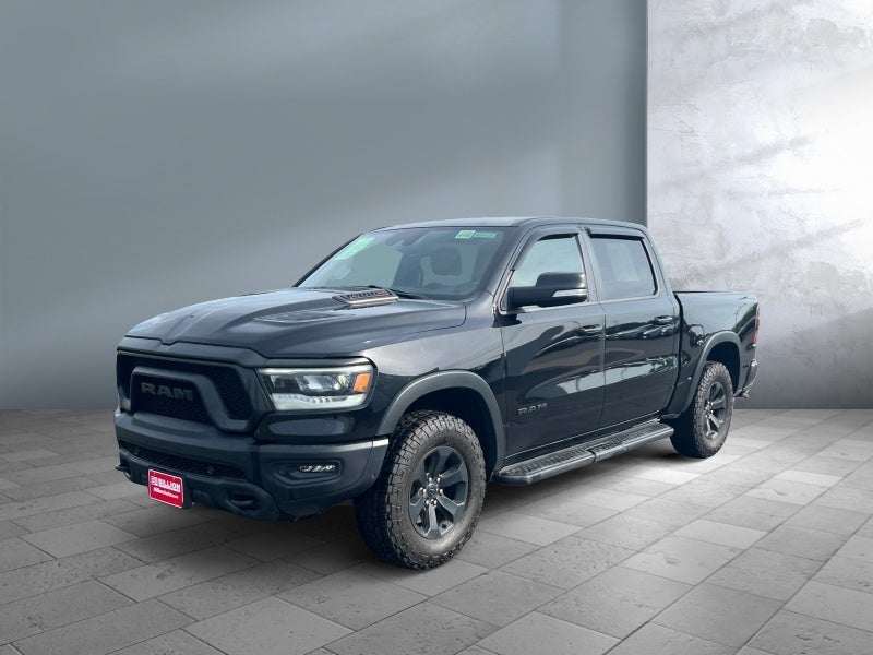 2022 RAM 1500 Rebel in Diamond Black Crystal Pearlcoat — front three-quarter view