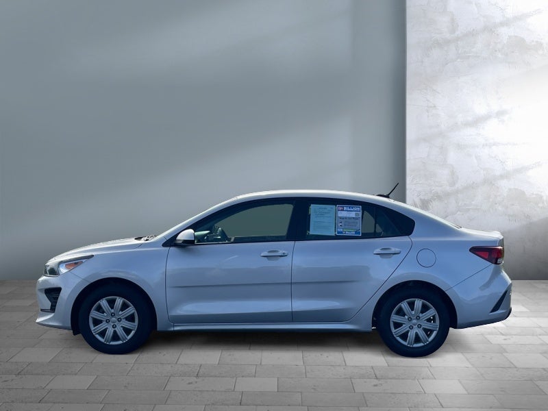 2023 Kia Rio — rear three-quarter view