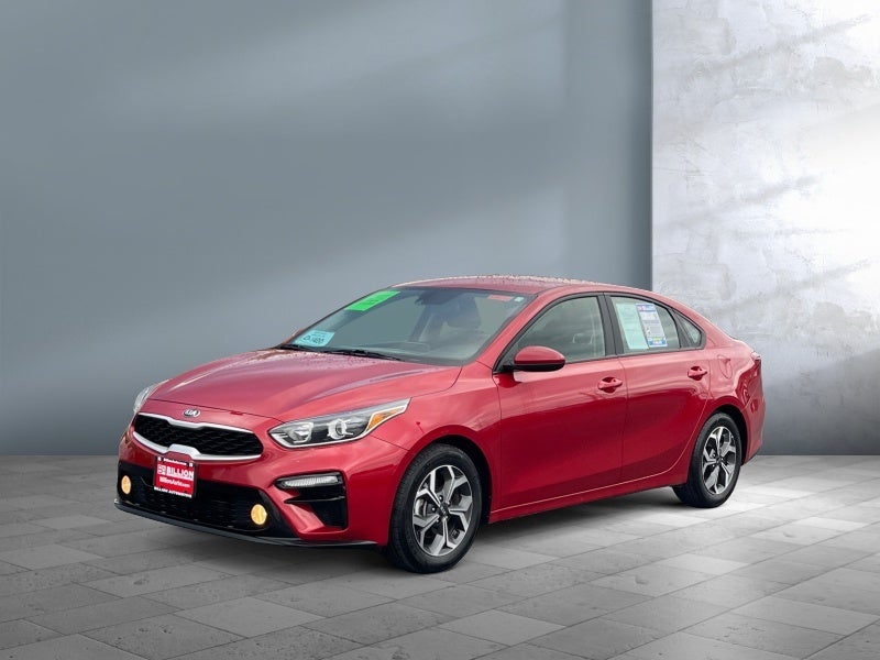 2020 Kia Forte LXS in Currant Red — front three-quarter view