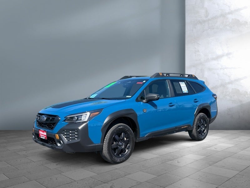 2024 Subaru Outback Wilderness in Geyser Blue — front three-quarter view
