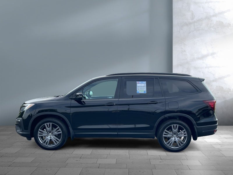 2022 Honda Pilot — rear three-quarter view