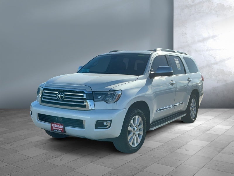 2018 Toyota Sequoia Platinum in Blizzard Pearl — front three-quarter view