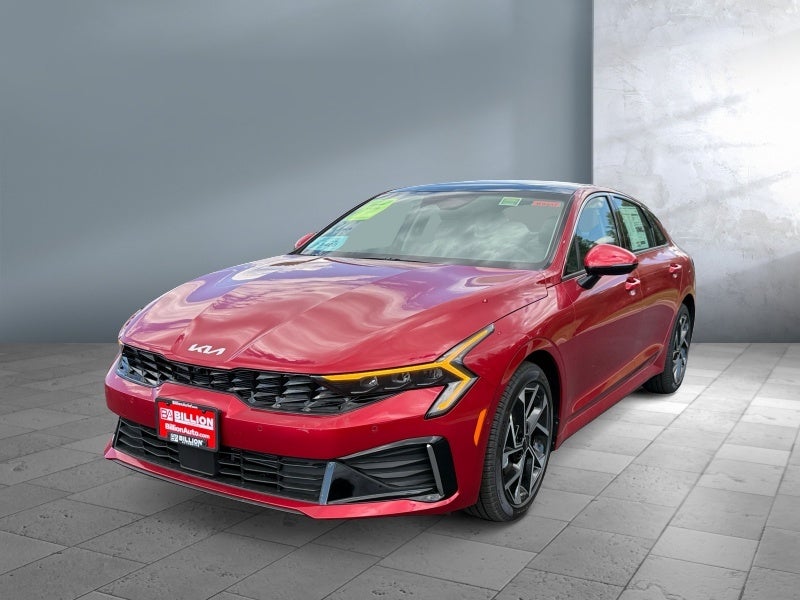 2026 Kia K5 EX in Red — front three-quarter view