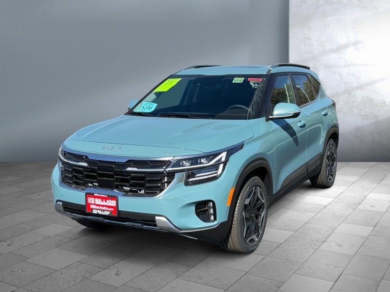 2026 Kia Seltos SX in Pluton Blue — front three-quarter view