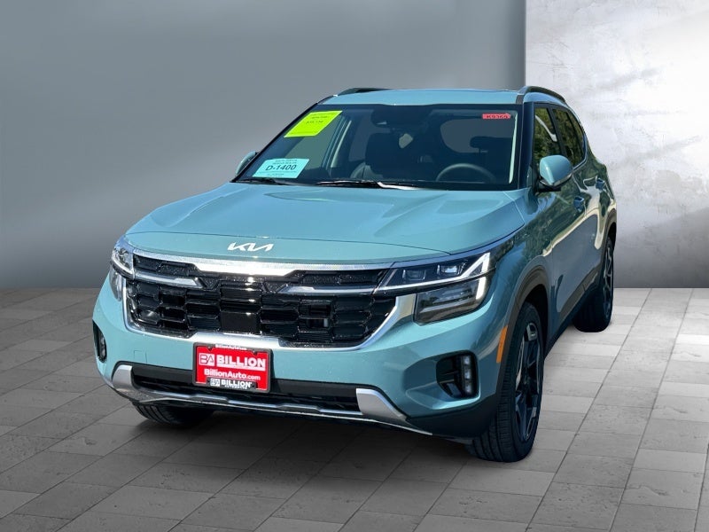 2026 Kia Seltos SX in Pluton Blue — front three-quarter view