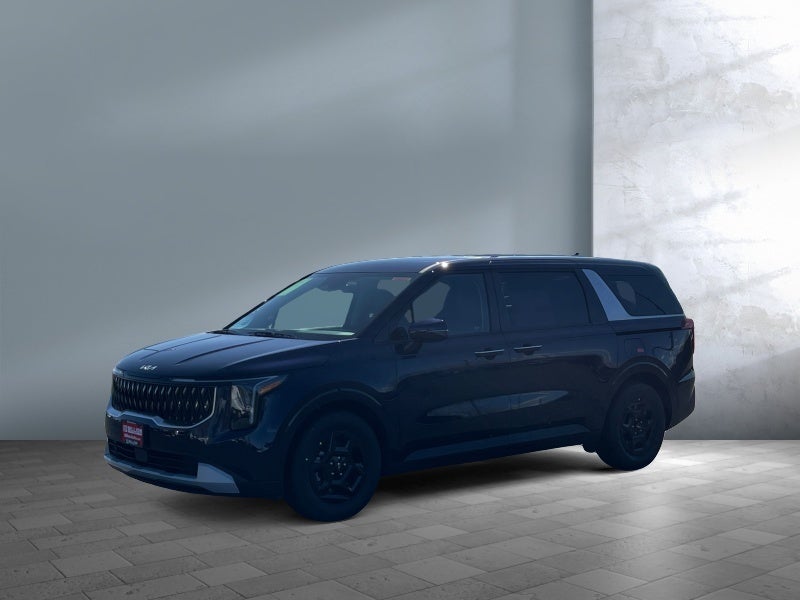 2026 Kia Carnival LX in Deep Chroma Blue — front three-quarter view